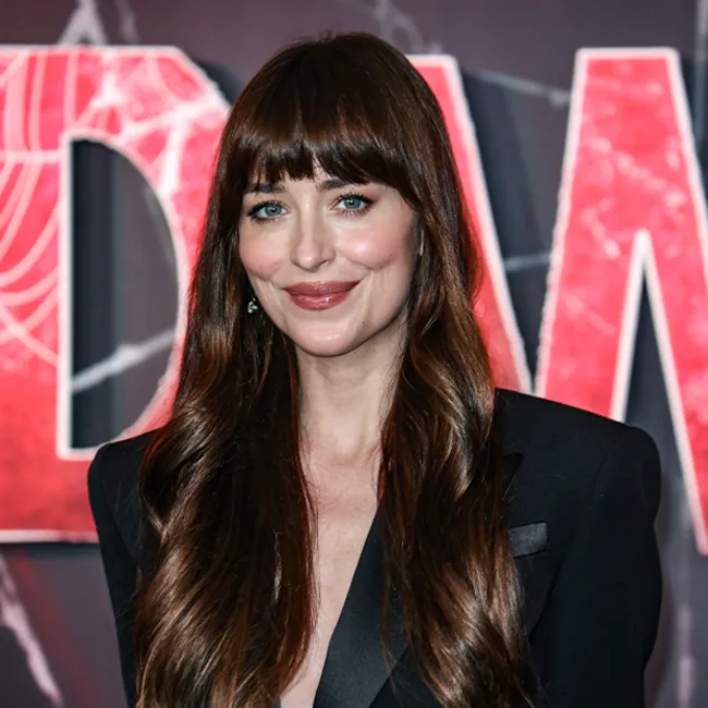 Dakota Johnson at Madam Web photo call, showcasing her stylish look.