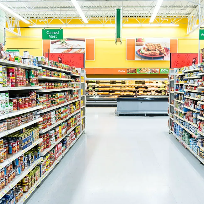"Grocery store aisles filled with products"