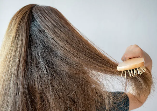woman-brushing-hair