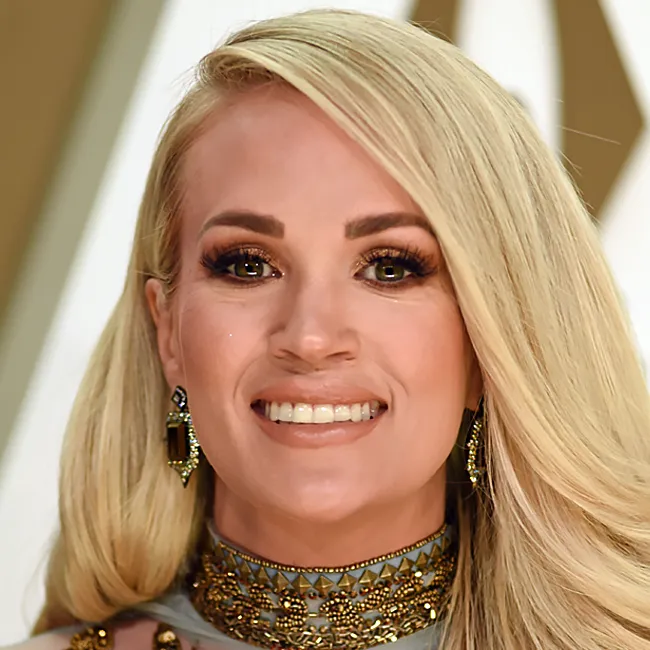 Carrie Underwood attending the 53rd Annual CMA Awards red carpet.