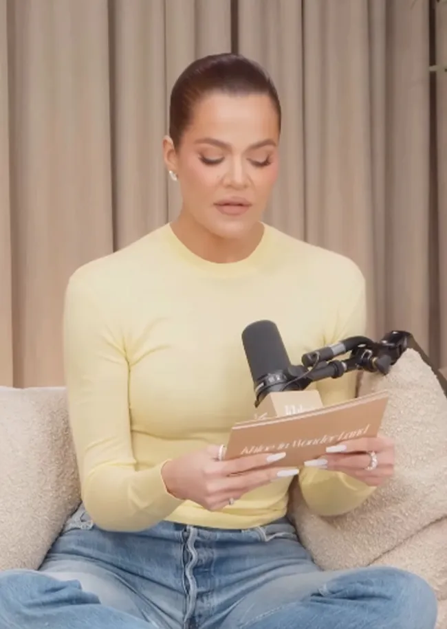 Khloe Kardashian promoting her new podcast episode.
