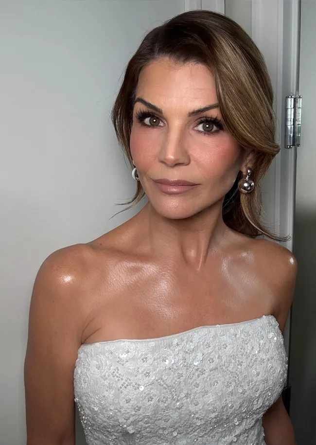 Lori Loughlin showcasing a stunning hairstyle by her hair artist.