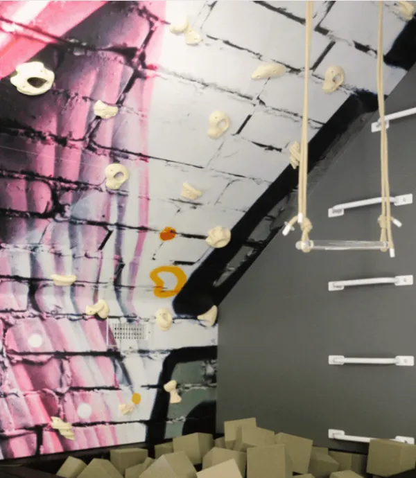 Vibrant acrylic trapeze for interactive playroom fun.