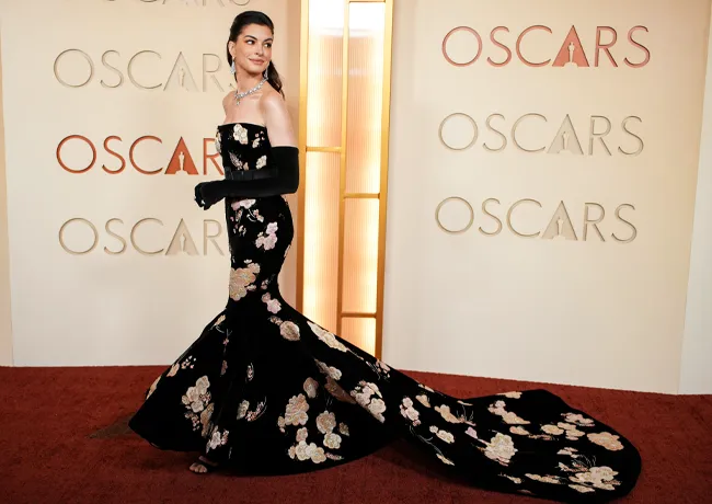Anne Hathaway in a floral dress at the Oscars.