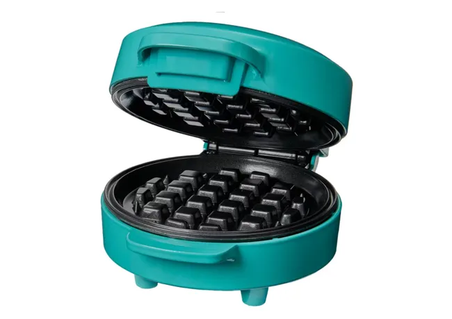 Compact mini waffle maker for quick breakfast options.