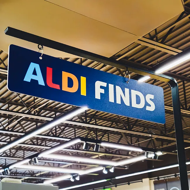 ALDI Finds sign with Crofton product boxes on display.