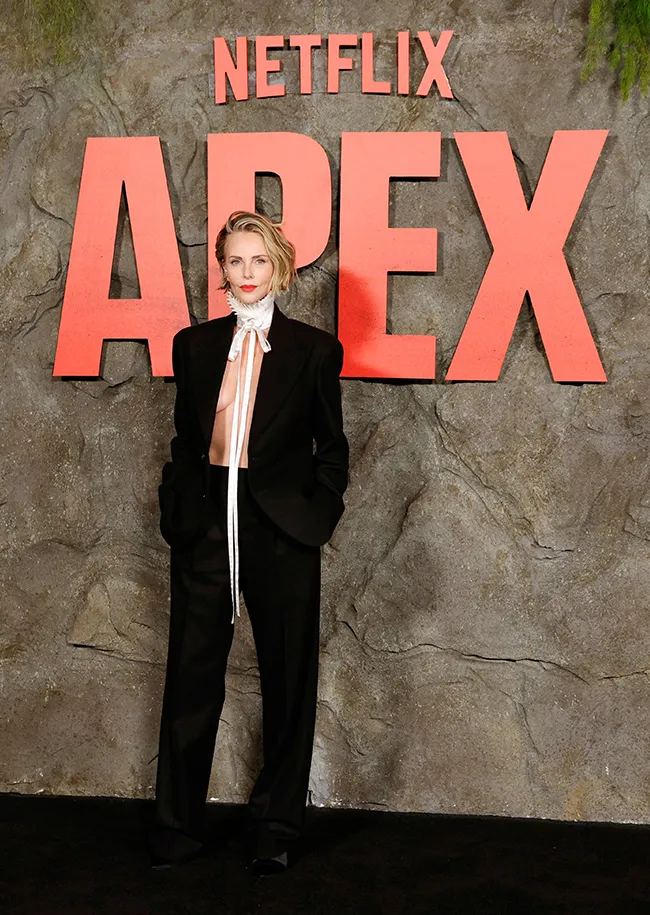 Charlize Theron Apex premiere Dior suit