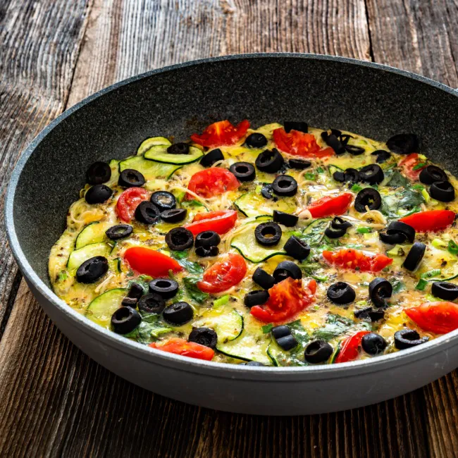 Colorful fruits and vegetables promoting anti-aging benefits for skin health.