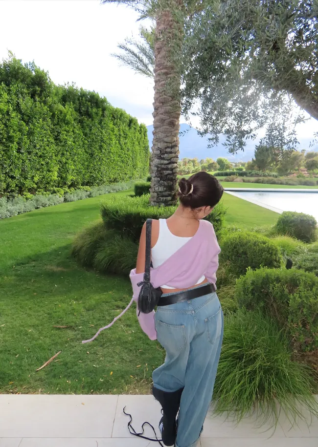 Penelope Disick wearing age-appropriate outfits from Kourtney Kardashian's Instagram.