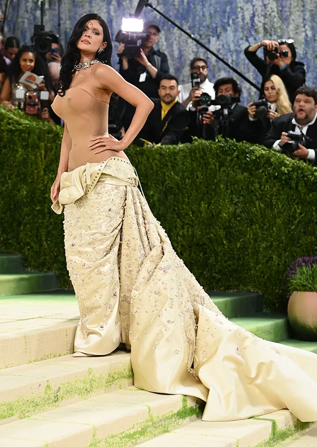 Kylie Jenner dazzles in bold red dress at Met Gala 2023.