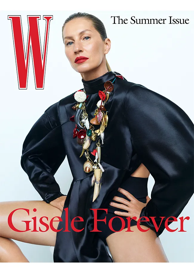 Gisele Bündchen poses confidently on magazine cover.