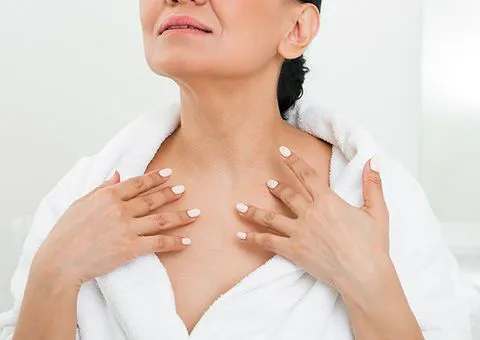 woman-touching-neck