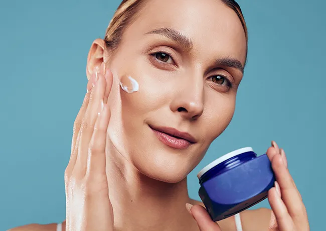 woman-moisturizing-skin