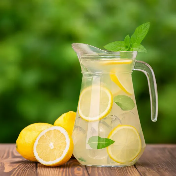 Close-up of a chilled glass of lemonade with ice.
