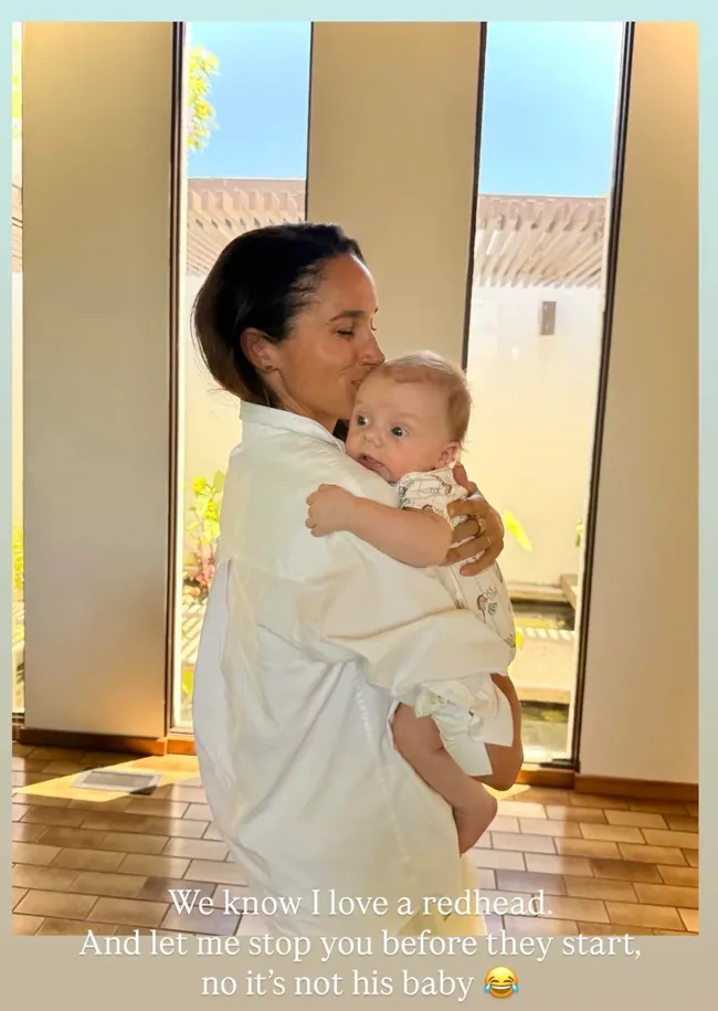 Meghan Markle with friend's baby