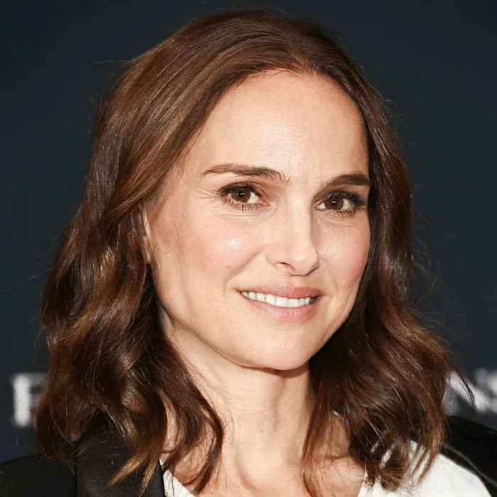 Natalie Portman at Golden Globes party, showcasing her style.
