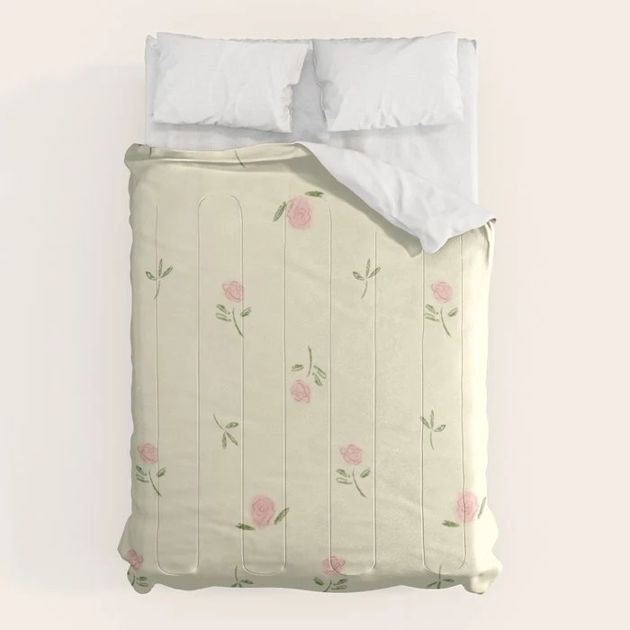 "Dainty Dreams Comforter with soft floral design"