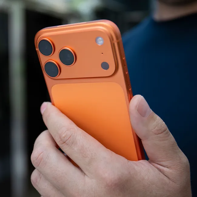 Close-up of male hands holding an Apple iPhone 17 Pro Max
