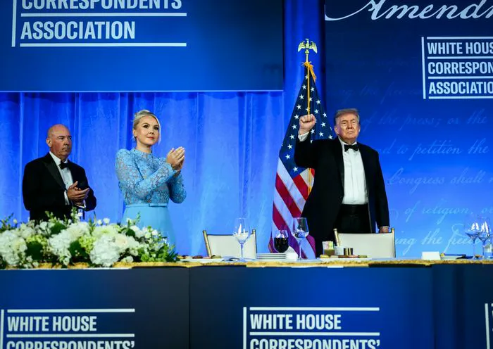 "Karoline Leavitt and Donald Trump at the WHCA Dinner"
