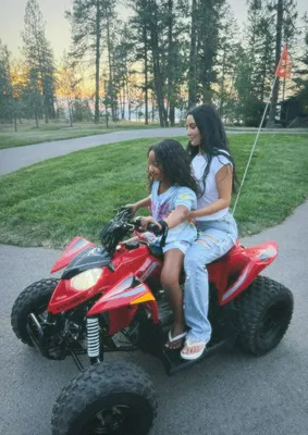 "Kim Kardashian's daughter Chicago riding an ATV"