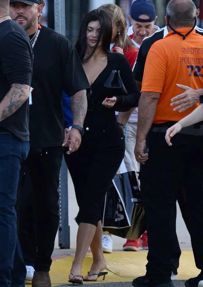 "Kylie Jenner wearing an all-black outfit at the FIFA World Cup Final"