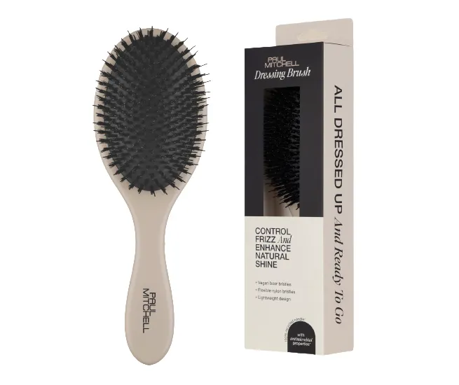 Paul Mitchell dressing brush for smooth and polished hairstyles.
