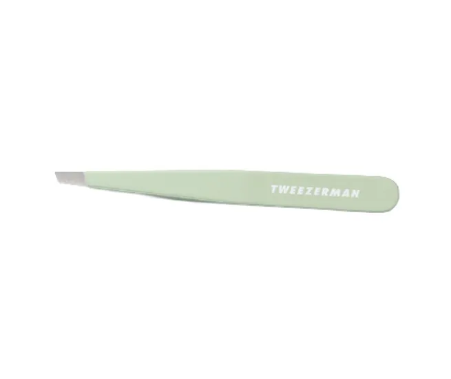 Pistachio slant tweezer for precise hair removal and grooming.
