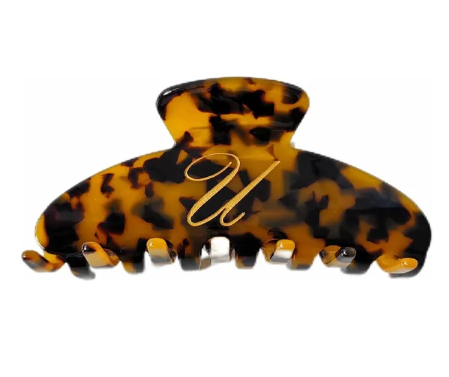 RPZL monogram claw clip for stylish and secure hair styling.