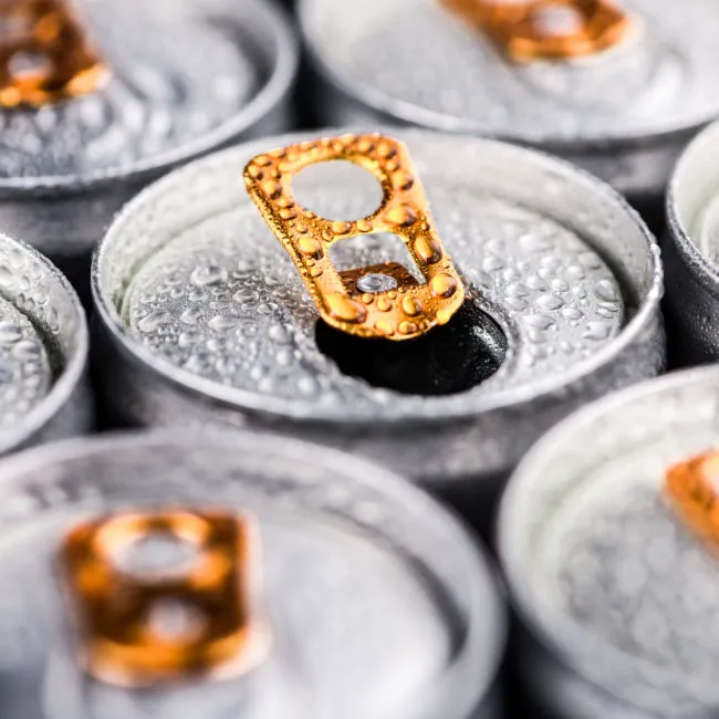 "Cans of energy drinks on display"