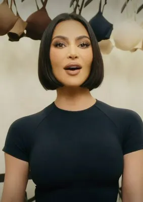 "Screenshot of Kim Kardashian's blunt bob hairstyle from SKIMS ad"