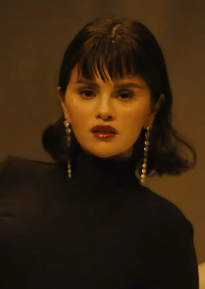 "Screenshot of Selena Gomez from 'In The Dark' music video"