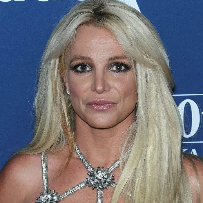 "Mature woman taking vitamin supplements"