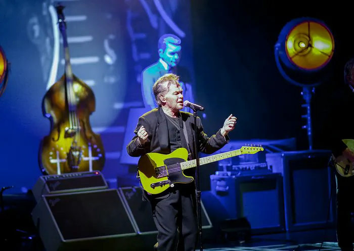 John Mellencamp performing