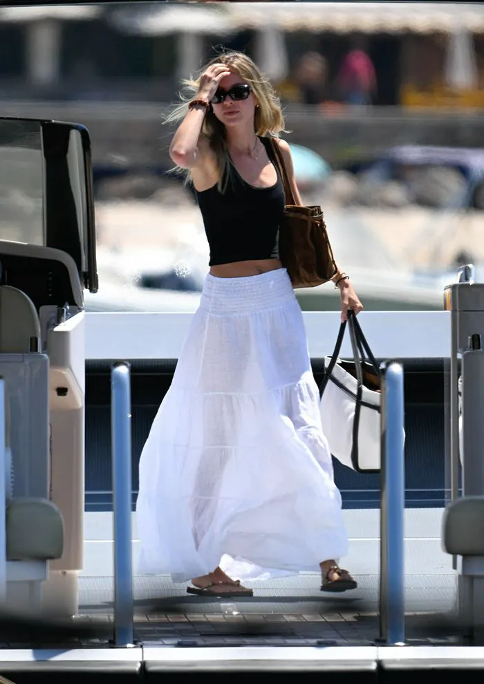 "Luisa Laemmle steps onto a boat in Mallorca"