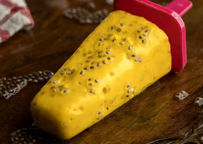 "Mango Coconut Chia Popsicles on a plate"