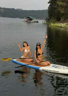 Kim Kardashian and Penelope Disick paddleboarding