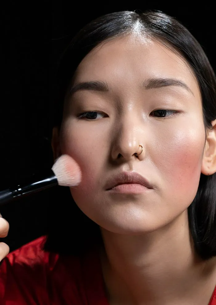 applying-blush-low