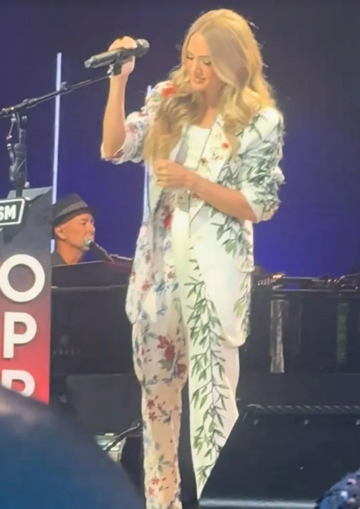 "Carrie Underwood posing at Grand Ole Opry event"