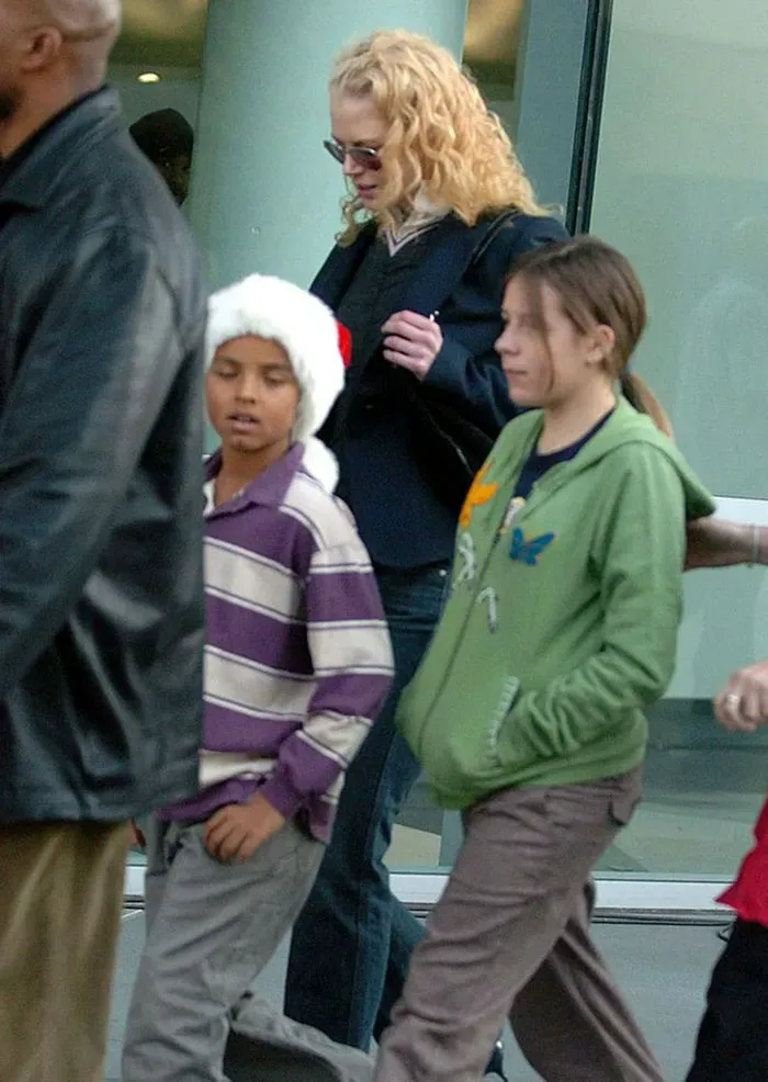 Conner and Isabelle Cruise with Nicole Kidman at an event