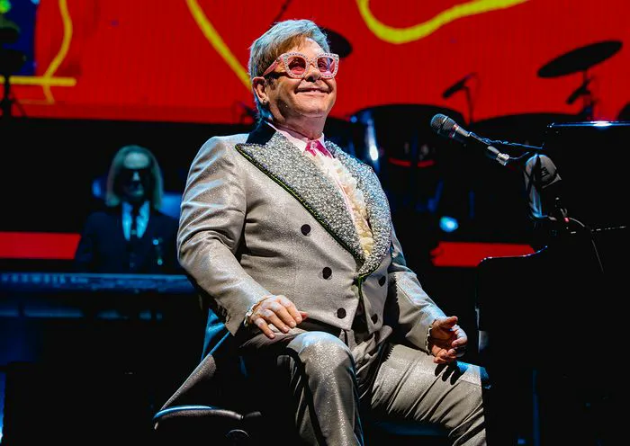 Elton John performing