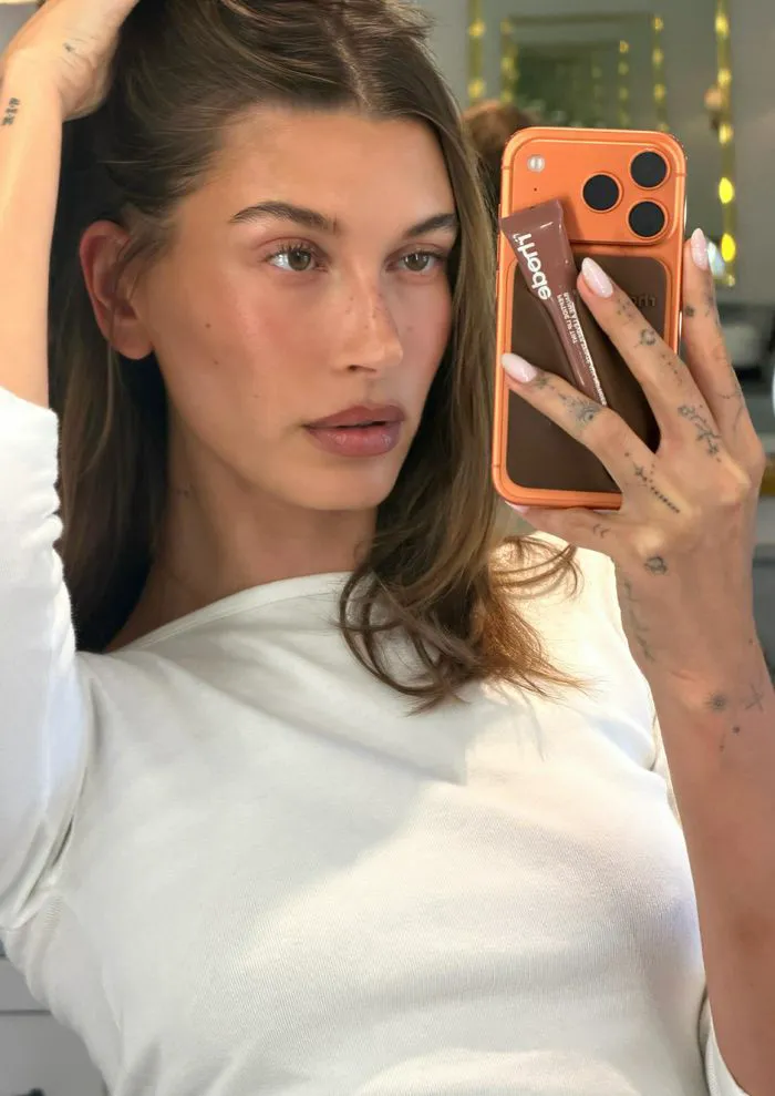 "Hailey Bieber showcasing coconut jelly nails"