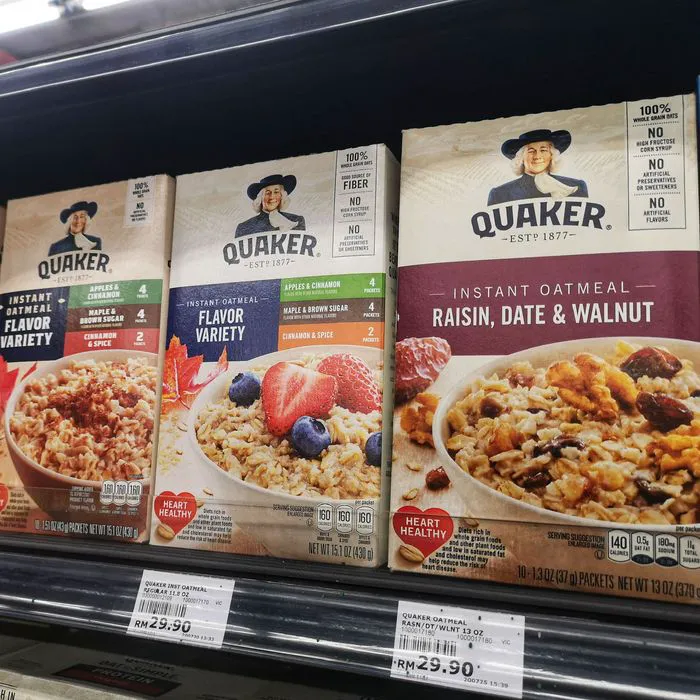 "Packaged instant oatmeal on a countertop"