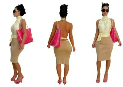 Kim Kardashian in a yellow outfit with a pink bag during fitting