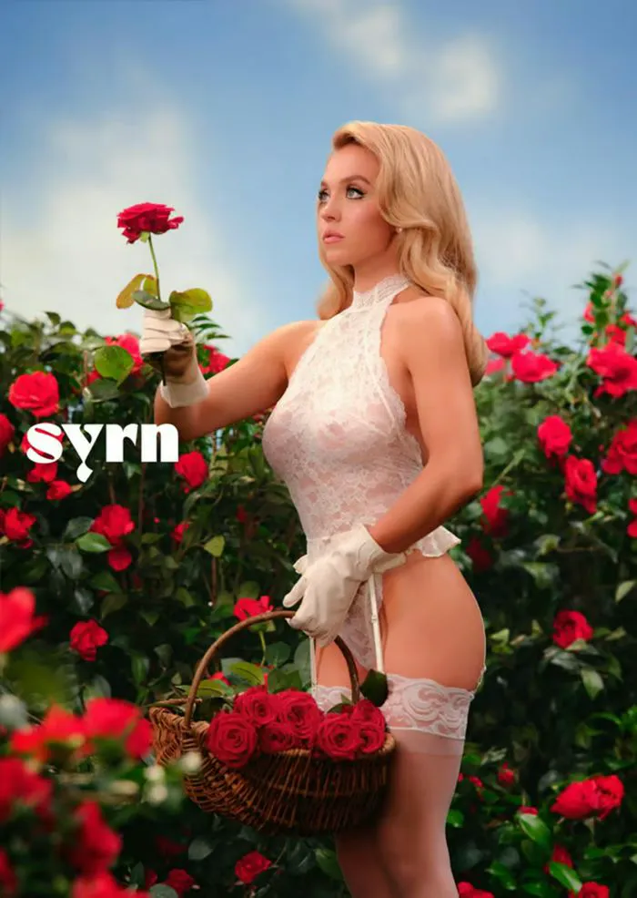 "Sydney Sweeney holding a rose while promoting her lingerie brand SYRN"