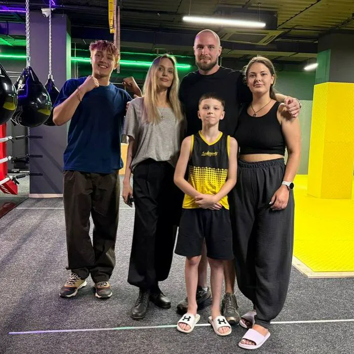"Angelina Jolie at a boxing club in Ukraine with son Knox"