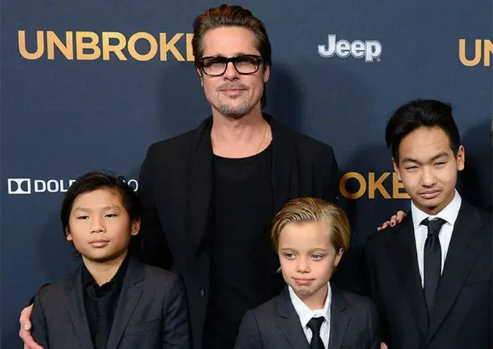 "Brad Pitt with his sons at Unbroken premiere"