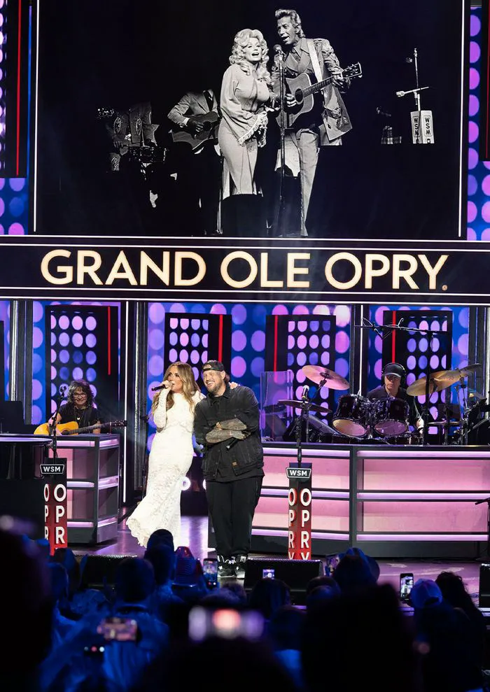 "Carly Pearce and Jelly Roll performing at Grand Ole Opry"