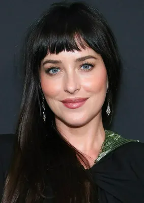 Dakota Johnson showcasing micro bangs at Kering Foundation dinner.