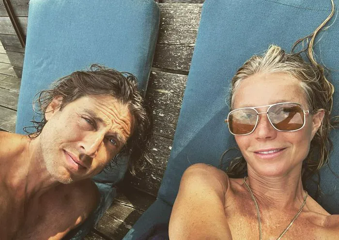 "Gwyneth Paltrow and her husband taking a selfie"