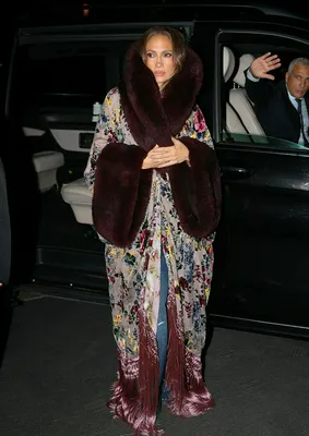 "Jennifer Lopez in a floral robe at Milan Fashion Week"